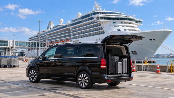 Black Mercedes-Benz V-Class with cases loaded at a cruise terminal